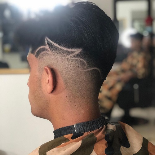 Mid-Fade Haircut with Design