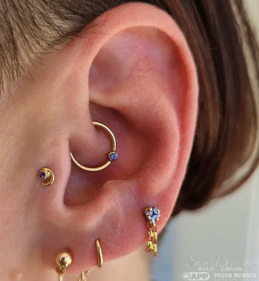 close up of various ear piercings 