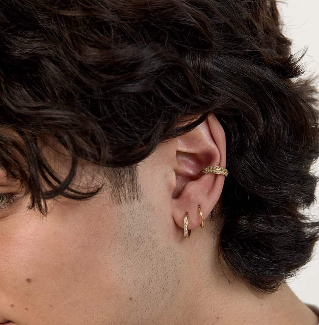 close up of a men's conch ear piercing
