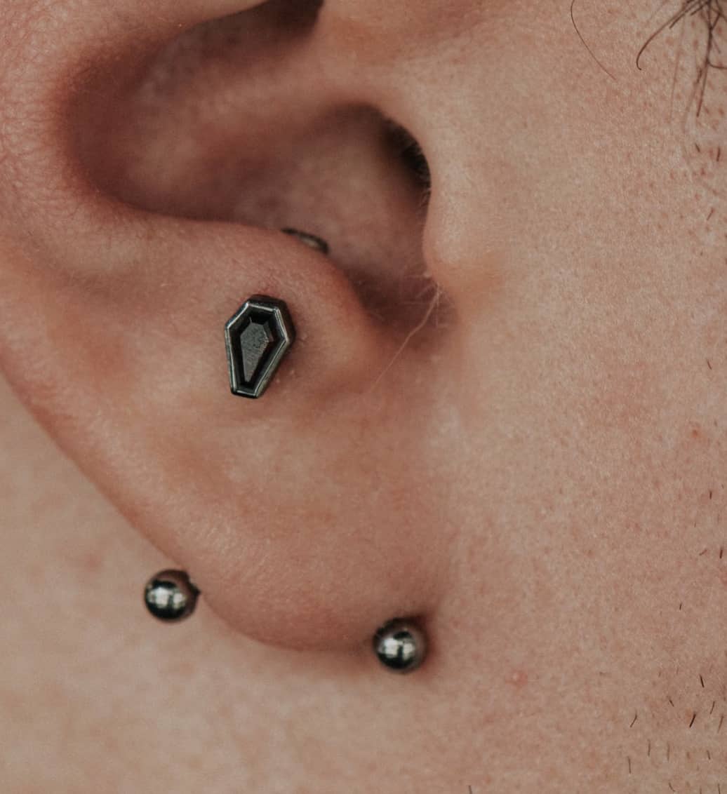 close up of an anti-tragus piercing 
