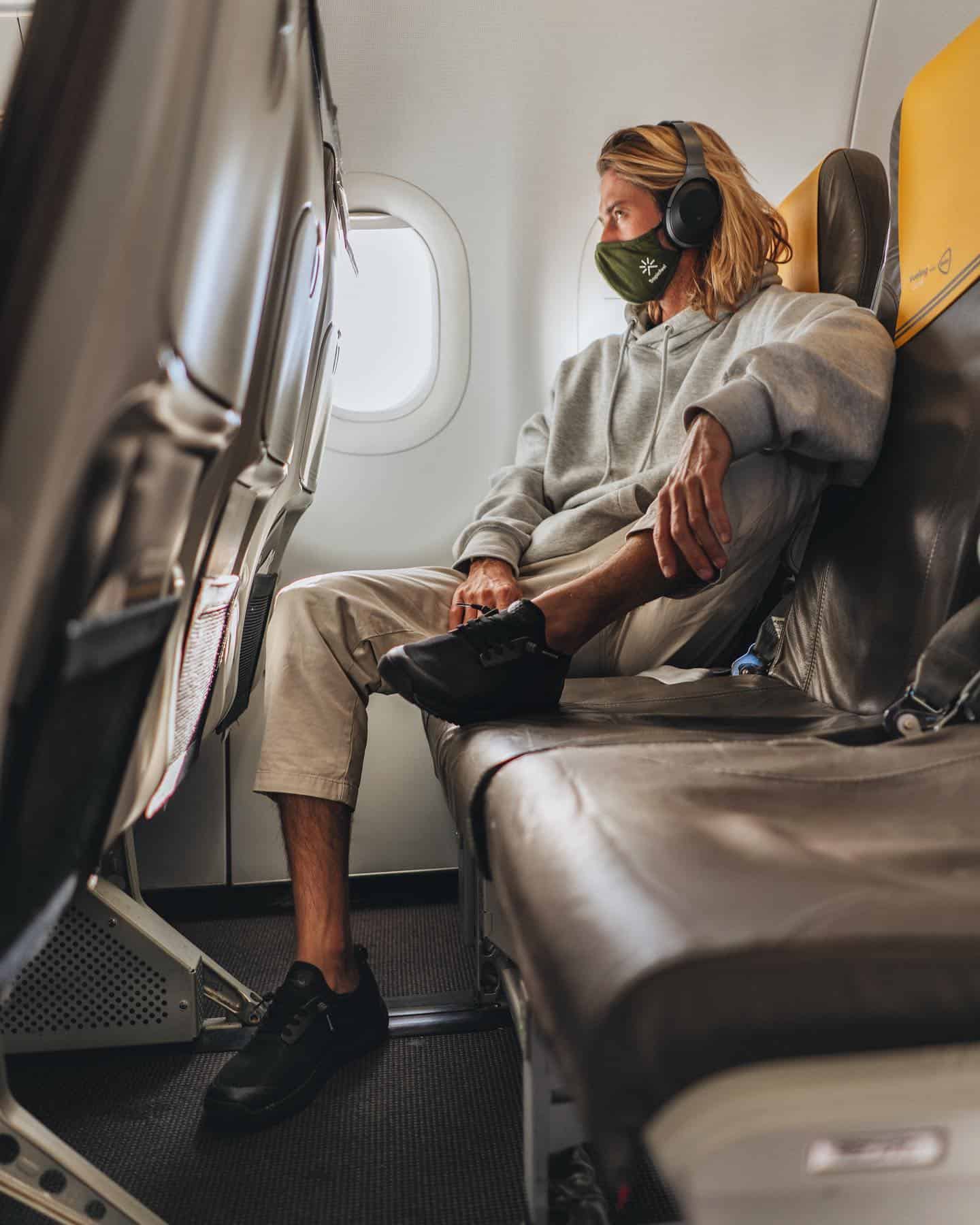 man traveling in an airplane